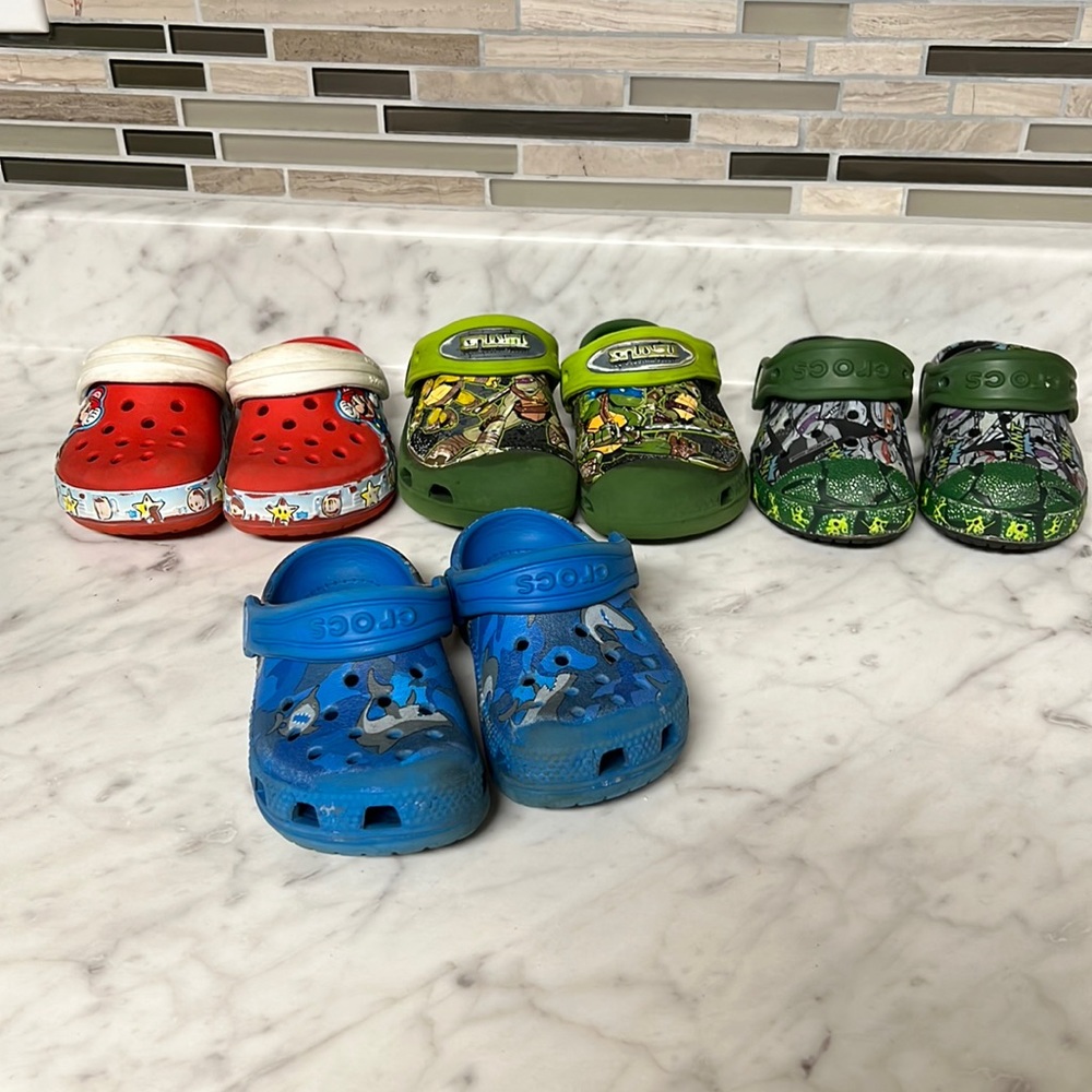 Crocs 4 sets of authentic crocs all size 6 in toddler